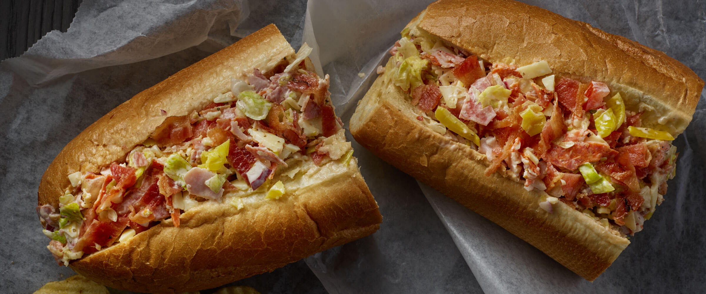 Chopped Italian Sub Sandwich on parchment paper