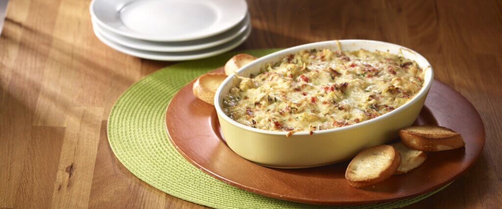 https://www.hormel.com/brands/hormel-canned-meats/wp-content/uploads/sites/15/hot_chicken_artichoke_dip-1-1024x427.jpg