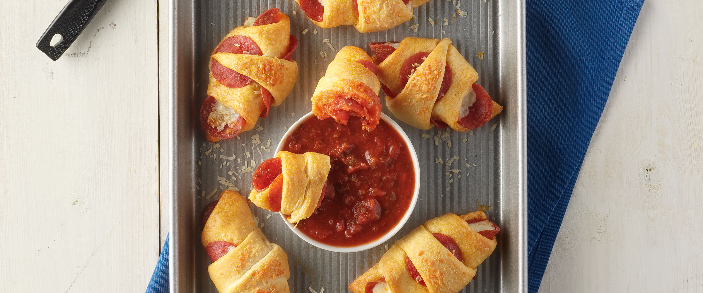 https://www.hormel.com/brands/hormel-pepperoni/wp-content/uploads/sites/3/Recipes_2400_HORMEL_pepperoni_pizza_crescent_rolls.jpg